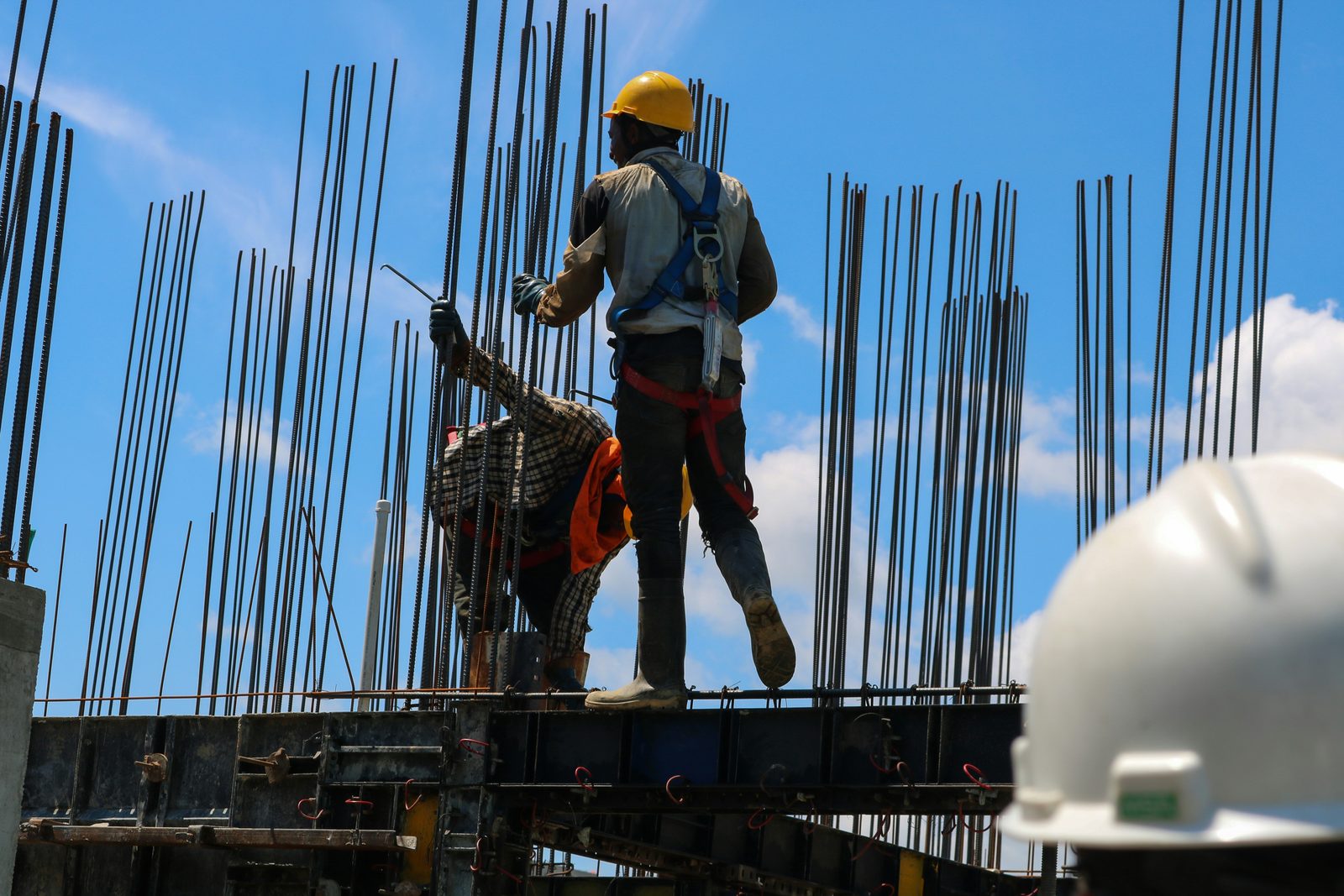 Steel fixers working on site